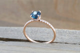 Hidden Halo Round London Blue Topaz Ring