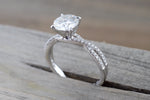 Gold Infinity Twist Moissanite Engagement Ring Charles & Colvard M3085 Lab Grown Diamond