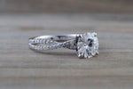 Gold Infinity Twist Moissanite Engagement Ring Charles & Colvard M3085 Lab Grown Diamond