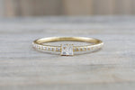 14kt Yellow Gold Round Brilliant And Baguette Cut Diamond Ring