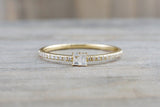 14kt Yellow Gold Round Brilliant And Baguette Cut Diamond Ring