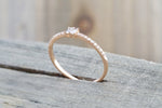 14kt Rose Gold Round Brilliant And Baguette Cut Diamond Ring