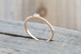 14kt Rose Gold Round Brilliant And Baguette Cut Diamond Ring