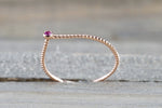 14k Rose Gold Round Cut Pink Sapphire Bezel Fashion Ring Rope Design Band