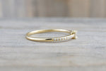 14kt Yellow Gold Round Brilliant And Baguette Cut Diamond Ring
