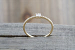 14kt Yellow Gold Round Brilliant And Baguette Cut Diamond Ring