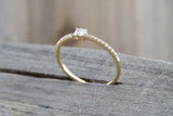 14kt Yellow Gold Round Brilliant And Baguette Cut Diamond Ring