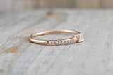 14kt Rose Gold Round Brilliant And Baguette Cut Diamond Ring