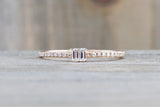 14kt Rose Gold Round Brilliant And Baguette Cut Diamond Ring
