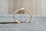 14kt Rose Gold Round Brilliant And Baguette Cut Diamond Ring
