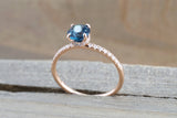 Hidden Halo Round London Blue Topaz Ring