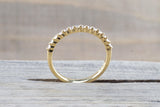 18kt Yellow Gold Shared Single Prong Diamond Band