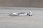 Under Hidden Halo Round Diamond Engagement Ring