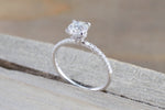 Under Hidden Halo Round Diamond Engagement Ring