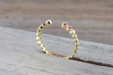 18kt Yellow Gold Round Cut Ruby and Diamond Bezel Fashion Ring Bead Design Band