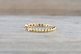 18kt Yellow Gold Round Cut Ruby and Diamond Bezel Fashion Ring Bead Design Band