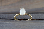 14k Yellow Gold Fire Opal Oval Shape Ring Bead Rope Design